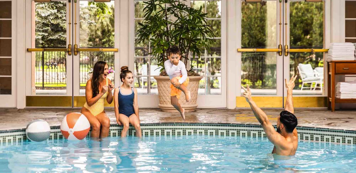 A Group Of People In A Swimming Pool